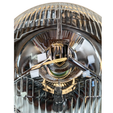Load image into Gallery viewer, 7” Tripod P700 Head lamp units. 1 Pair  ‘Halogen PL’ Shield motif includes Halogen and side lamp bulbs. CL0603 £65.00 Pair
